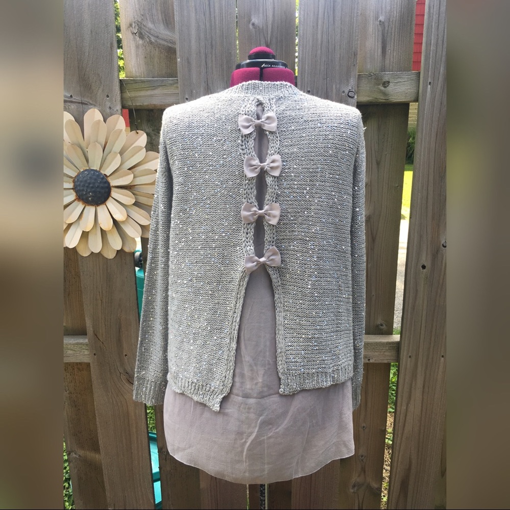 Silver and grey sequin sweater with bows